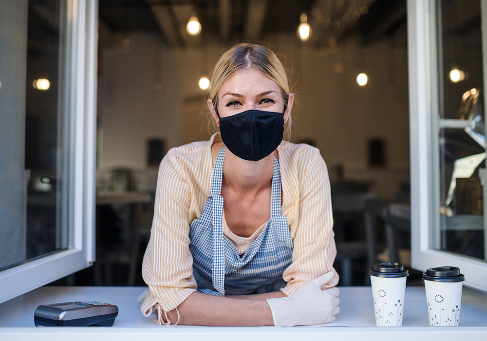 Restaurant worker smiling